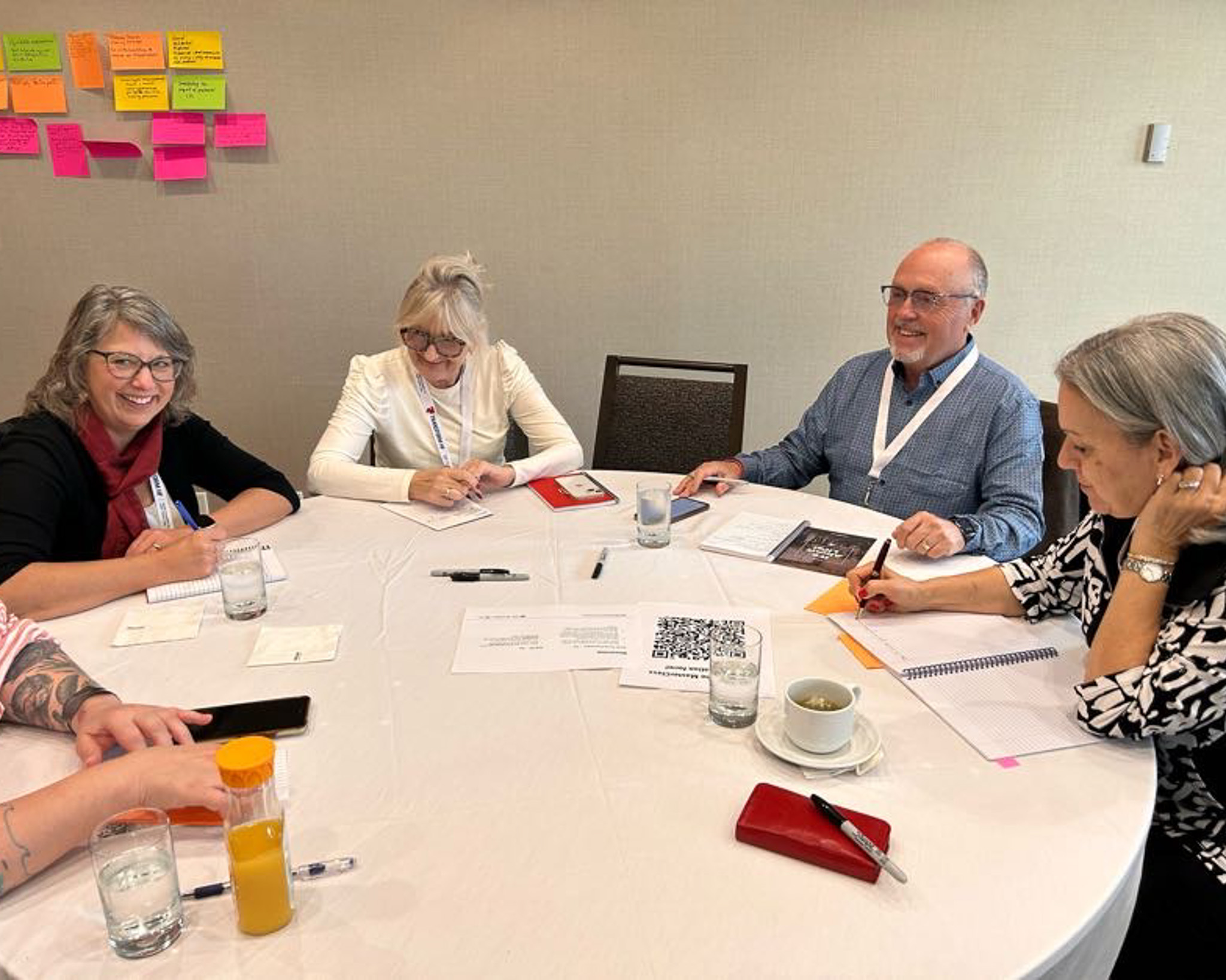 People with lived experience and researchers gathering for a workshop.